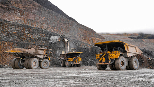 Drone surveying a construction or mining site